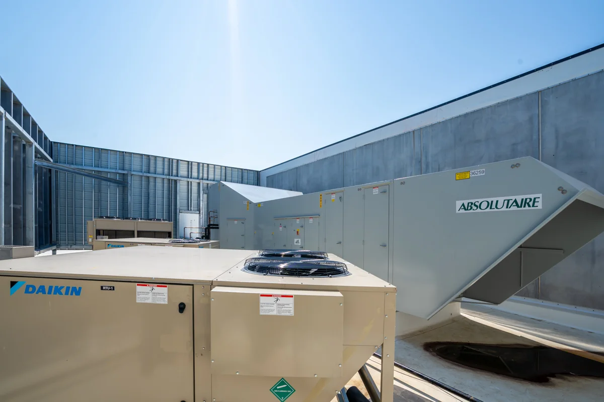 Rooftop makeup-air equipment and air-cooled HVAC units.